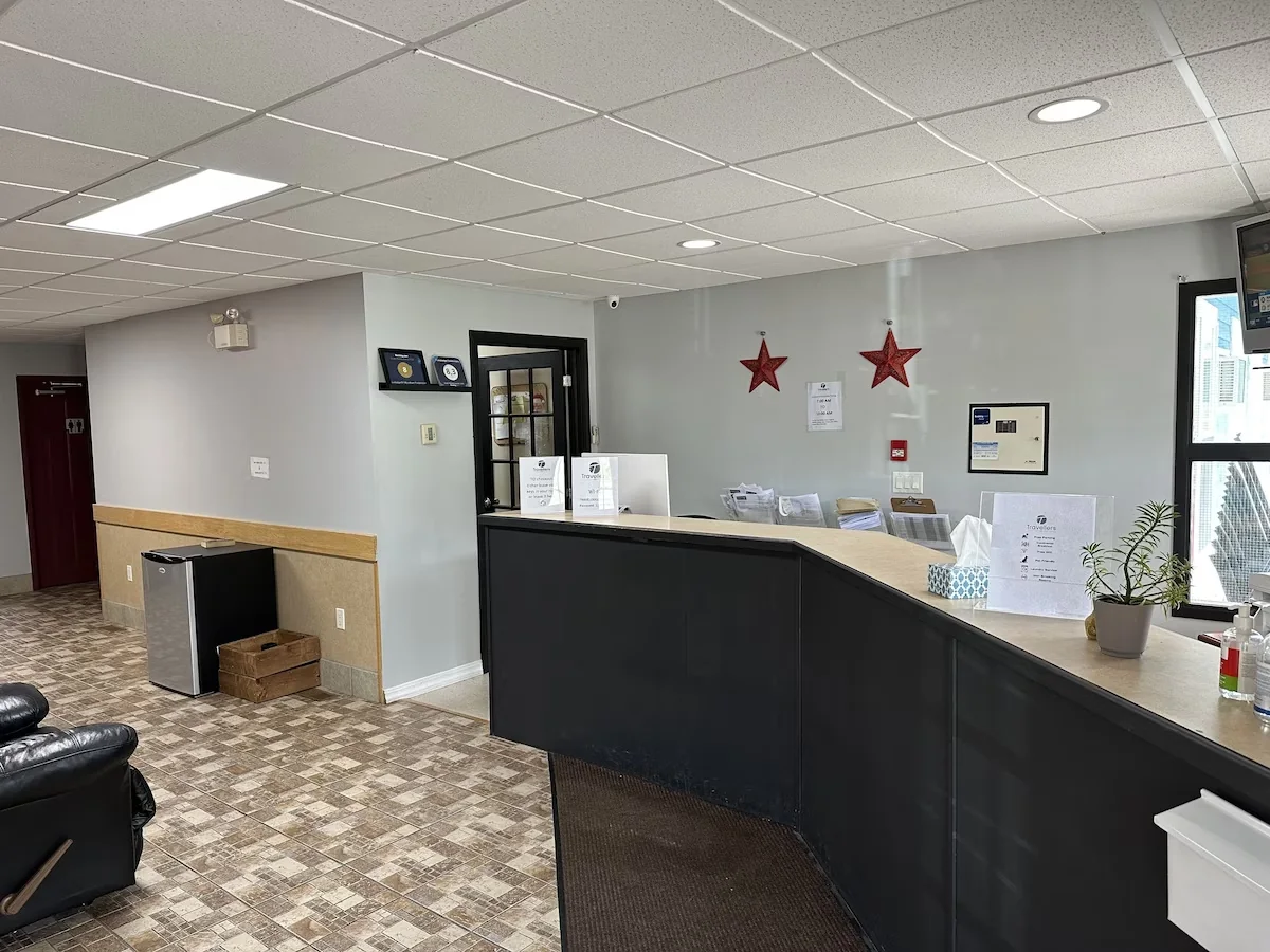 Front desk and reception area at Travellers Inn